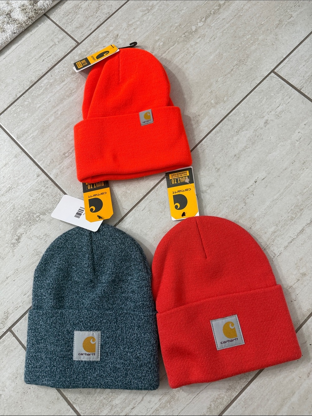 Carhartt unisex Beanies in Bright Orange and blue tweed and tomato red $15 each